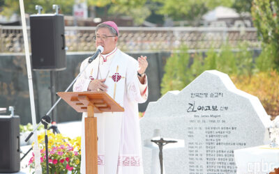 Bishop Blesses Statue and Mural of Columban Martyr