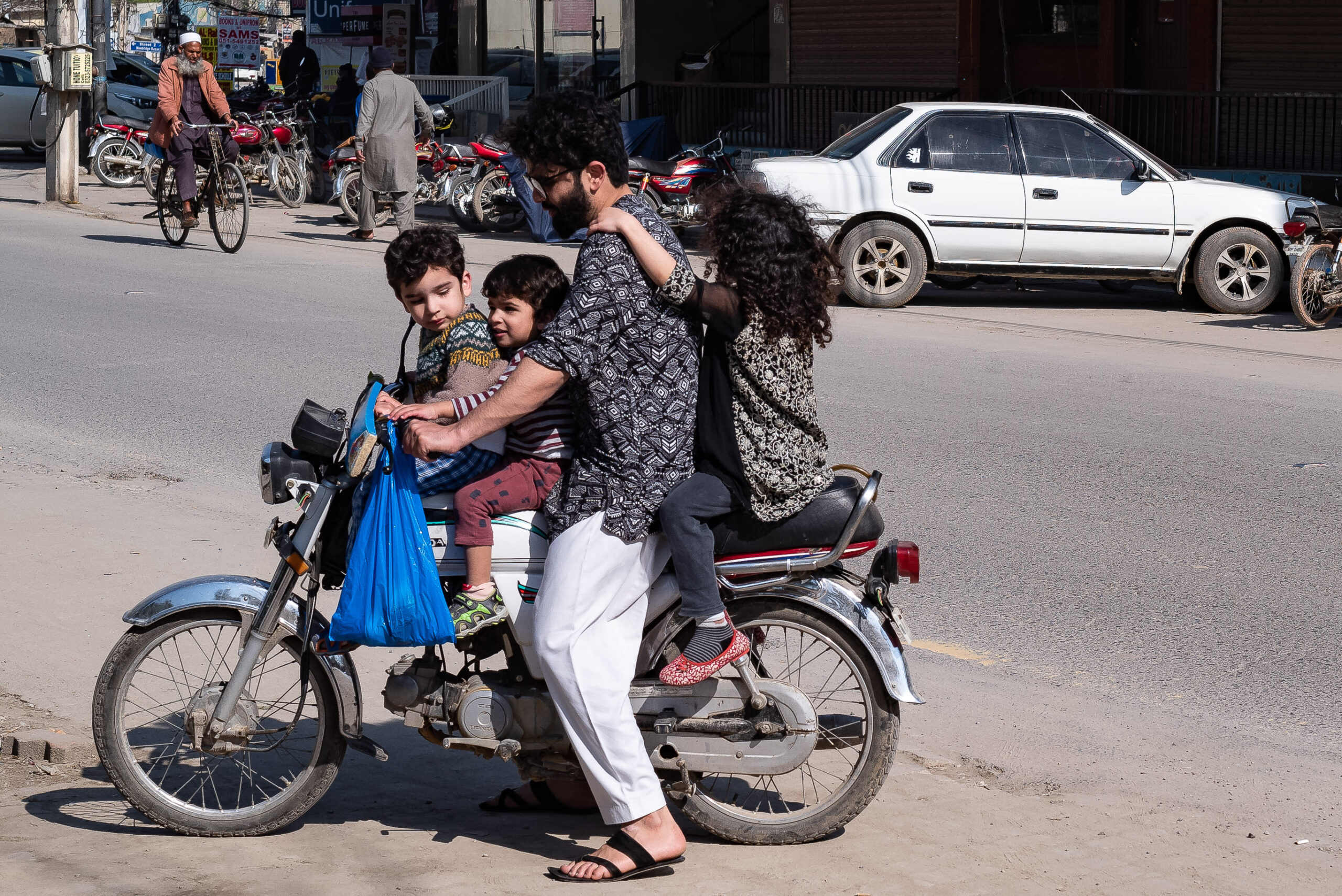 Rawalpindi,,Punjab/,Pakistan-,March,2019:,A,Family,Gets,On,Motorbike